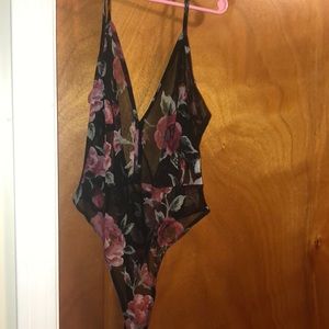 Floral pin under top